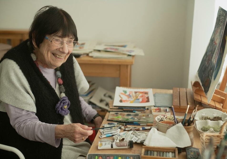 elderly woman painting